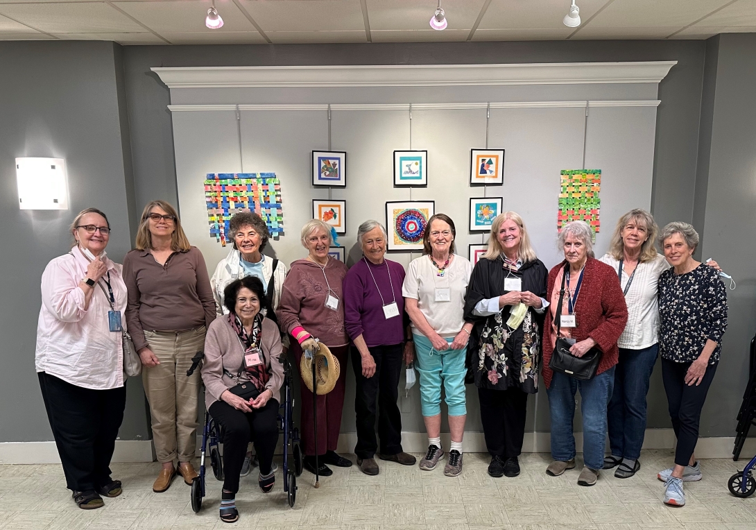 Members of the Elderberry Club smile for a photo